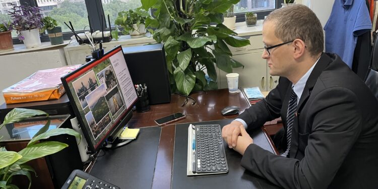 Professor Thomas Weise gives an online presentation of Hefei University during a meeting of the German University Consortium for International Cooperations (DHIK), June 10, 2022. [Photo provided to China.org.cn]