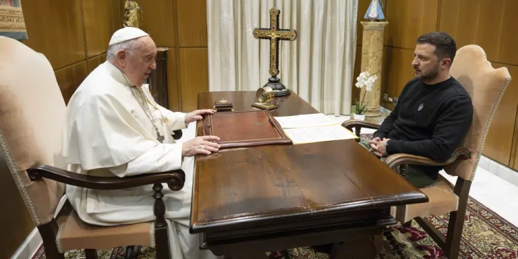 This image made available by Vatican News shows Pope Francis meeting Ukrainian President Volodymyr Zelenskyy during a private audience at The Vatican, Saturday, May 13, 2023. Francis recently said that the Vatican has launched a behind-the-scenes initiative to try to end the war launched last year by Russia. (Vatican News via AP)