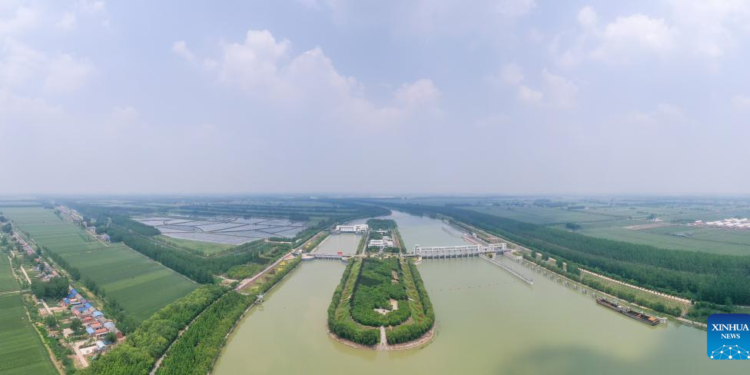This aerial panoramic photo taken on May 12, 2023 shows a pumping station of South-to-North Water Diversion Project in Sihong County, east China's Jiangsu Province. The eastern and middle routes of China's South-to-North Water Diversion Project have benefited more than 150 million people, China South-to-North Water Diversion Co., Ltd. said Sunday.

The project has transferred 62 billion cubic meters of water to the drought-prone north via the eastern and middle routes, according to the company. (Photo by Fang Dongxu/Xinhua)