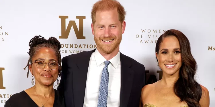 Doria Ragland, Prince Harry and Meghan attend the Ms. Foundation Women of Vision Awards in New York on Tuesday.Kevin Mazur / Getty Images for Ms. Foundation for Women