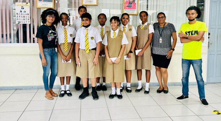 Members of the Queens College STEM club, team mentor Ms Diane Henery and STEMGuyana Representatives Ms Alisha Koulen and Mr Dominic Budhan