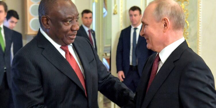 Russian President Vladimir Putin (left) speak with South Africa's President Cyril Ramaphosa following a meeting with delegation of African leaders in Saint Petersburg. Photo: AFP