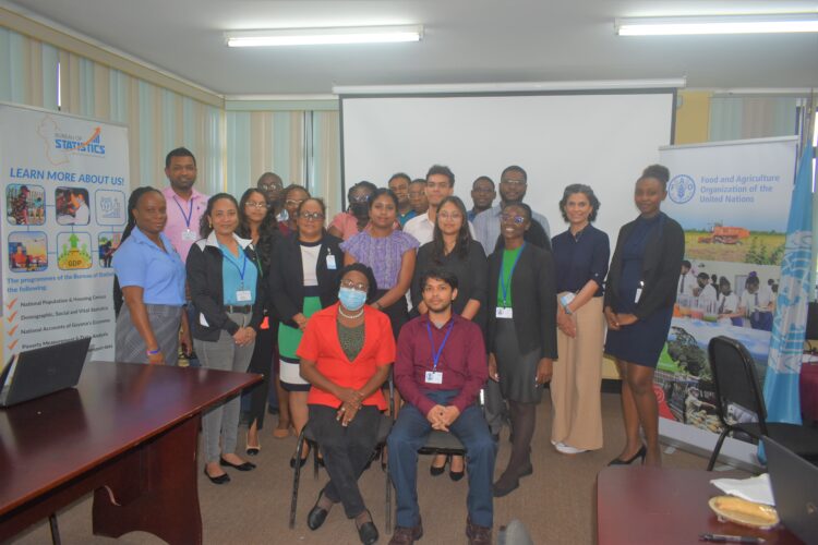 FAO Training Facilitator, Maria Rodriguez DeEspaña (second from right) and participants of the training