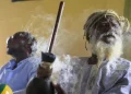 Ras Jah, a member of the Ras Freeman Foundation for the Unification of Rastafari, prepares to pass a chalice pipe with marijuana to the left during service in the tabernacle on Sunday, May 14, 2023, in Liberta, Antigua. The Rastafari faith is rooted in 1930s Jamaica, growing as a response by Black people to white colonial oppression. The beliefs are a melding of Old Testament teachings and a desire to return to Africa. (Photo: Jessie Wardarski/AP)