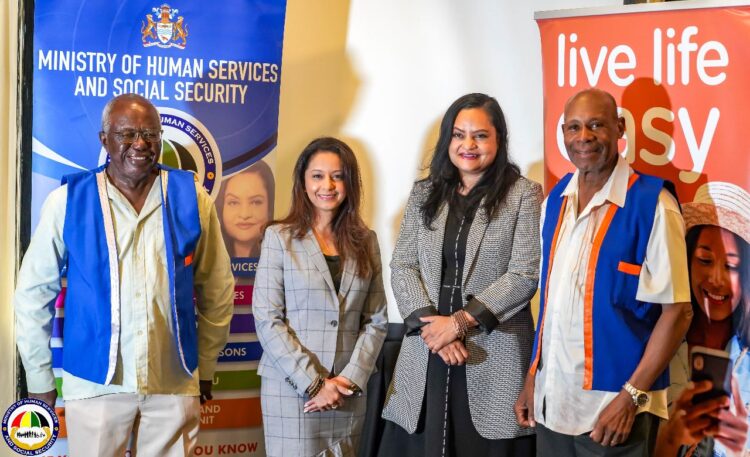 Minister of Human Services and Social Security, Dr. Vindhya Persaud (second from right) along with mmg General Manager, Bobita Ram and pensioners, Reginald Simpson (extreme left) and Donald Nurse pose for a photo opportunity at the launch of the new old age pension delivery system