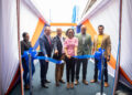 he opening of the National Small Business Week 2022 ribbon ceremony from the left is CEO of GTT, Damian Blackburn, Immediate Past President of the GCCI, Timothy Tucker, Minister of Tourism, Industry, and Commerce, Hon. Oneidge Walrond, Chief Operations Officer of GTT Business Solutions, Orsen Ferguson and Chairman of the National Small Business Week, Dr. Rosh Khan