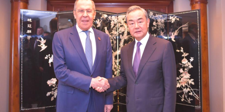 Director of the Office of the Central Commission for Foreign Affairs Wang Yi (R) meets with Russian Foreign Minister Sergei Lavrov in Jakarta, Indonesia, on July 13, 2023. (Xinhua/Xu Qin)