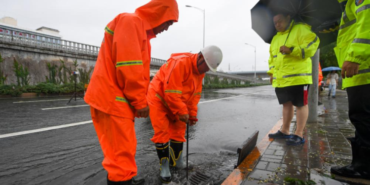 Water drainage work is carried out on a road in Chaoyang District, Beijing, capital of China, July 30, 2023.

Impacted by Typhoon Doksuri, the fifth typhoon of this year, heavy rainfall has hit north China regions, including Beijing, Hebei and Shandong. (Xinhua/Ju Huanzong)