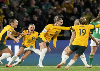 Australia's Steph Catley, centre, celebrates after scoring from the penalty spot during the Women's World Cup football match against Ireland at Stadium Australia in Sydney, Australia, Thursday, July 20, 2023. (AP Photo/Mark Baker).