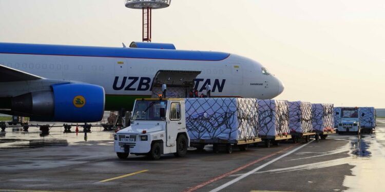 The first batch of Chinese COVID-19 vaccines arrives at Tashkent International Airport in Tashkent, Uzbekistan, March 27, 2021. (Photo by Zafar Khalilov/Xinhua)