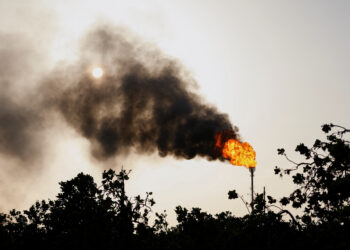 FILE PHOTO: Gas flares are seen at the state-owned oil company PDVSA, in Punta de Mata, Venezuela April 5, 2023. REUTERS/Leonardo Fernandez Viloria/File Photo