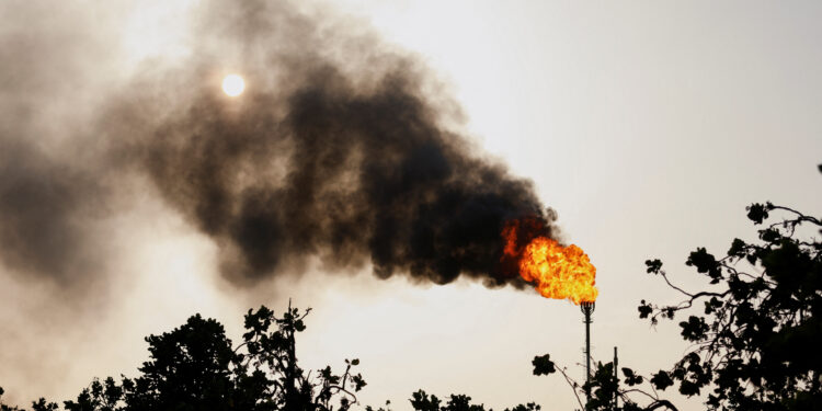 FILE PHOTO: Gas flares are seen at the state-owned oil company PDVSA, in Punta de Mata, Venezuela April 5, 2023. REUTERS/Leonardo Fernandez Viloria/File Photo