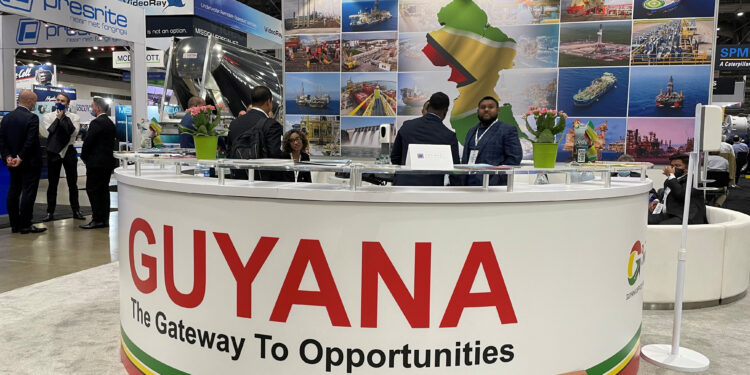 Guyana's booth is seen at the Offshore Technology Conference as Bharrat Jagdeo, the South American nation's vice president, told the conference it would be unfair to ask the developing nation not to develop its burgeoning oil resources, in Houston, U.S., date unknown. REUTERS/Sabrina Valle/File Photo Acquire Licensing Rights