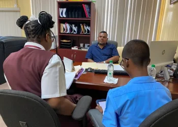 The Chief Statistician being interviewed by two of the students