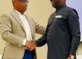 On the left is Tony Harris, President and CEO of e-Magic and on the right is Mr. Emmanuel Johnson, CEO of West Coast Gas Ghana exchanging a handshake after the signing Saturday.