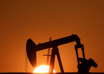 FILE PHOTO: An oil pump of IPC Petroleum France is seen during sunset outside Soudron, near Reims, France, February 6, 2023.  REUTERS/Pascal Rossignol