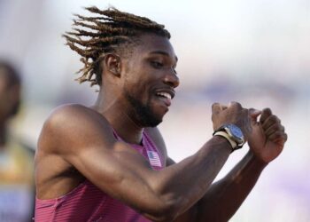 Noah Lyles, of the United States, reacts after winning a heat in the men's 200-metre at the World Athletics Championships on Monday.
