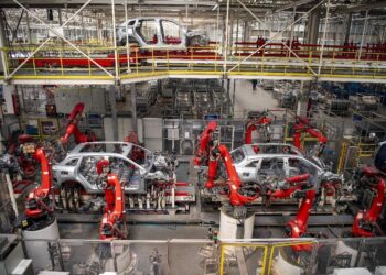 New energy vehicles are manufactured in an intelligent workshop of Chinese automobile manufacturer Leapmotor in Jinhua, east China's Zhejiang province. (People's Daily Online/Hu Xiaofei)