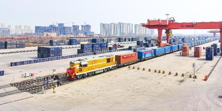 A freight train carrying 165 vehicles in 55 containers departs from Harbin, northeast China's Heilongjiang province, April 16, 2023. The train is expected to reach Europe via Manzhouli, China's largest land port. (People's Daily Online/Yuan Yong)