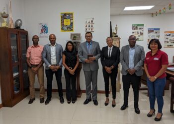 Guyana’s Ambassador to Cuba Mr. Halim Majeed in centre flanked on his right by Mr. Garfield Wiltshire – Treasurer of G.O.A., President of the Guyana Olympic Association, Mr. Godfrey Munroe and Secretary-General Ms. Vidushi Persaud-McKinnon. On his left, Vice-Presidents of the G.O.A., Ms. Cristy Campbell, Mr. Steve Ninvalle and Assistant Secretary Ms. Emelia Ramdhani.