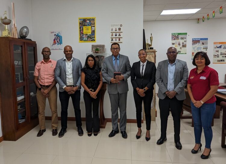 Guyana’s Ambassador to Cuba Mr. Halim Majeed in centre flanked on his right by Mr. Garfield Wiltshire – Treasurer of G.O.A., President of the Guyana Olympic Association, Mr. Godfrey Munroe and Secretary-General Ms. Vidushi Persaud-McKinnon. On his left, Vice-Presidents of the G.O.A., Ms. Cristy Campbell, Mr. Steve Ninvalle and Assistant Secretary Ms. Emelia Ramdhani.