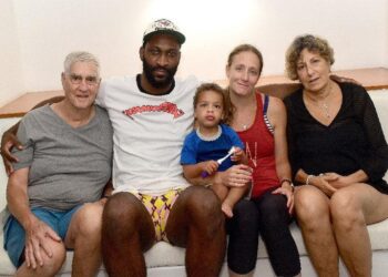 back home: US cancer patient Jay Bondell, from left, Trinidad-born US resident Adrian Crichlow, 22-month-old AJ Crichlow, Allison Bondell and Fredi Bondell at the Radisson Hotel Trinidad, Port of Spain, where they spoke with the Express last week. The family has since returned home. —Photo: Jermaine Cruickshank