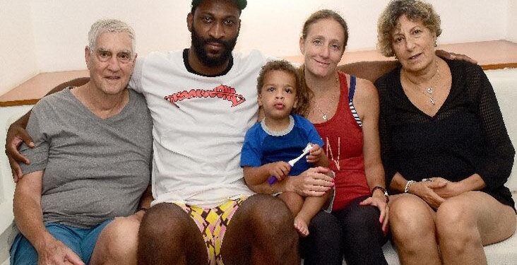 back home: US cancer patient Jay Bondell, from left, Trinidad-born US resident Adrian Crichlow, 22-month-old AJ Crichlow, Allison Bondell and Fredi Bondell at the Radisson Hotel Trinidad, Port of Spain, where they spoke with the Express last week. The family has since returned home. —Photo: Jermaine Cruickshank
