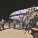Online fraud suspects are returned to China from Indonesia on a chartered flight on Wednesday. [PHOTO/CHINA DAILY]
