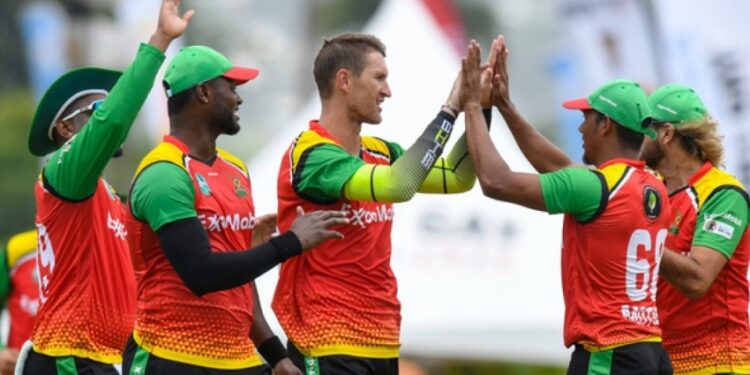 Guyana Amazon Warriors celebrate a wicket.CPL