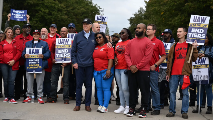 President Biden joins a picket line with members of the United Auto Workers at a General Motors Service Parts Operations plant in Belleville, Mich. on Tuesday. Photo: Jim Watson/Getty Images