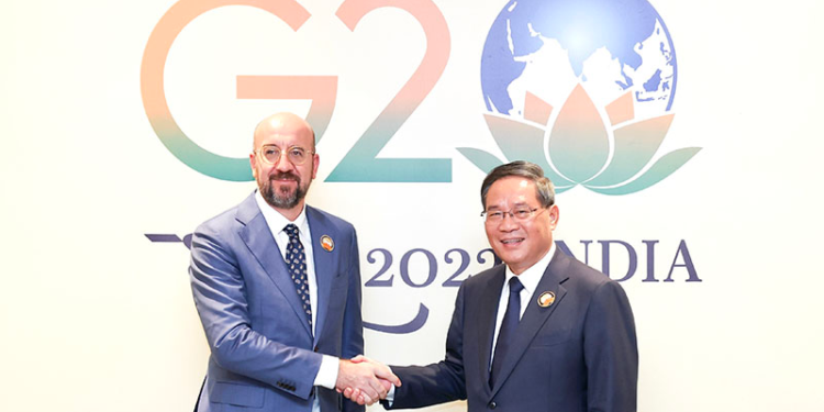 Chinese Premier Li Qiang (R) shakes hands with European Council President Charles Michel on the sidelines of the 18th G20 summit in New Delhi, India, September 10, 2023. /Xinhua