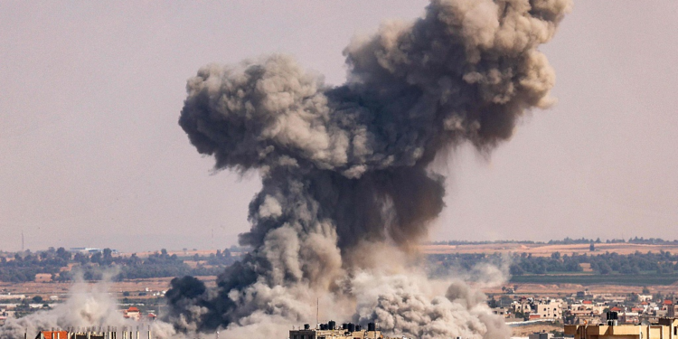 A smoke plume erupts during Israeli bombardment in Rafah in the southern of Gaza Strip, October 19, 2023. /CFP