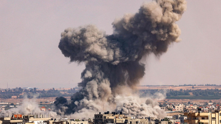 A smoke plume erupts during Israeli bombardment in Rafah in the southern of Gaza Strip, October 19, 2023. /CFP