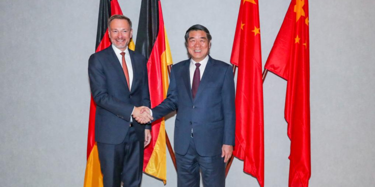 Chinese Vice Premier He Lifeng, also a member of the Political Bureau of the Communist Party of China Central Committee and the Chinese lead person of the third China-Germany high-level financial dialogue, shakes hands with Christian Lindner, the federal minister of finance and the German lead person of the dialogue, prior to the talks in Frankfurt, Germany, Oct. 1, 2023. The third China-Germany high-level financial dialogue, co-chaired by He and Lindner, was held in Frankfurt on Sunday. (Xinhua/Zhang Fan)