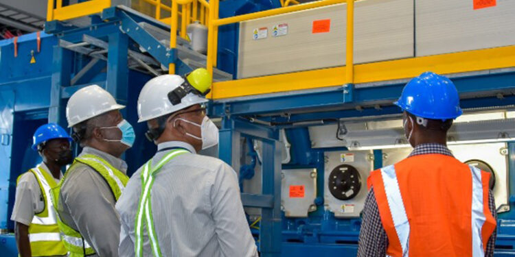 Prime Minister, Brigadier (Ret’d) Mark Phillips (second left) inspecting the power station (DPI)