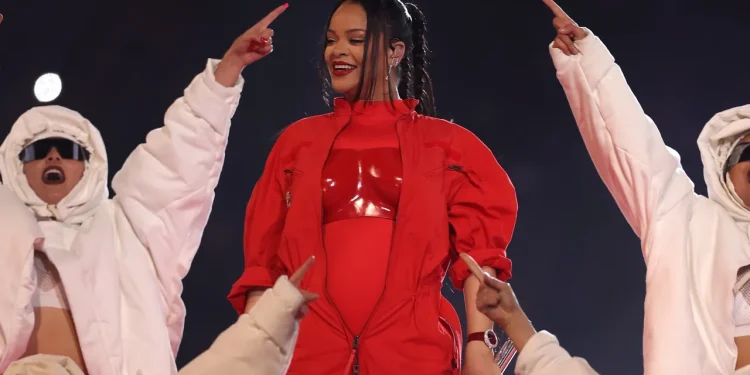 Rihanna is shown onstage during the Apple Music Super Bowl LVII Halftime Show at State Farm Stadium in Glendale, Arizona, on Feb. 12. It has officially earned the Guinness World Record for most watched Super Bowl performance. (Photo by Gregory Shamus/Getty Images)