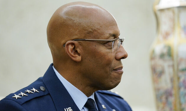 New Chair of the Joint Chiefs of Staff Gen. C.Q. Brown Jr., listens as he meets with President Joe Biden in the Oval Office of the White House, on Oct. 5, 2023. | Evan Vucci/AP