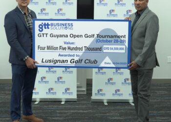 (from left) GTT's Sales Director, Mr. Hilton Wong and Mr. Patanjilee Persaud, President of the Lusignan Golf Club (LGC).