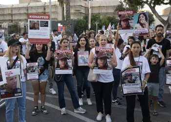 Family members of people taken hostage in Israel on Oct. 7 hold a demonstration in Tel Aviv on Oct. 26 calling on the government to bring them home. Photo: Amir Levy/Getty Images