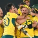 Australia players celebrate after winning the Cricket World Cup final.