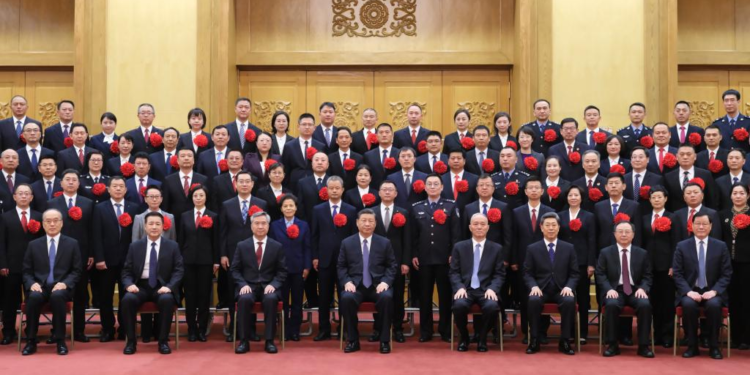 Party and state leaders Xi Jinping, Cai Qi and Li Xi meet with representatives of model units that apply the "Fengqiao model" for promoting community-level governance in Beijing, capital of China, Nov. 6, 2023. (Xinhua/Li Xueren)