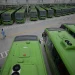 Electric public buses line a parking facility in Bogotá on Sept. 30, 2022. RAUL ARBOLEDA/AFP VIA GETTY IMAGES