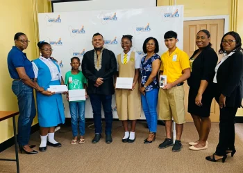 Some of the Winners flanked by Bureau of Statistics and CARICOM representatives