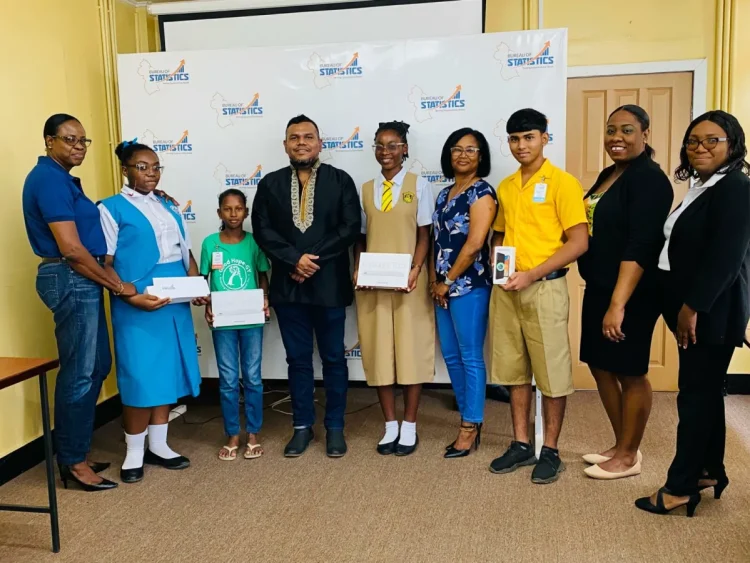 Some of the Winners flanked by Bureau of Statistics and CARICOM representatives