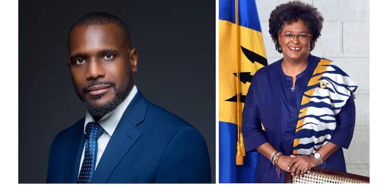 From (L) DLP Leader Dr. Ronnie Yearwood and Prime Minister Mottley