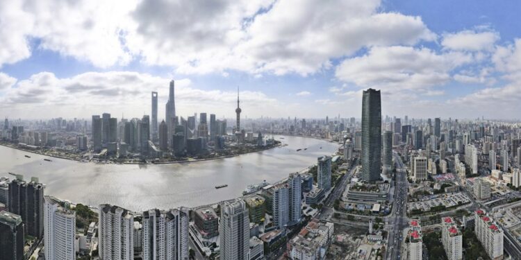 This aerial panoramic photo taken on Jan. 10, 2023 shows a view of Lujiazui area in the China (Shanghai) Pilot Free Trade Zone in east China's Shanghai. (Xinhua/Fang Zhe)