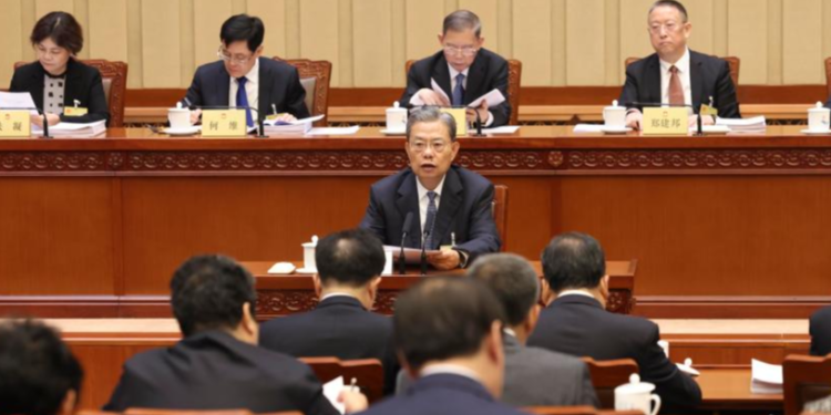 Zhao Leji, chairman of the National People's Congress Standing Committee, attends the second plenary meeting of the seventh session of the 14th NPC Standing Committee at the Great Hall of the People in Beijing, capital of China, December 26, 2023. /Xinhua