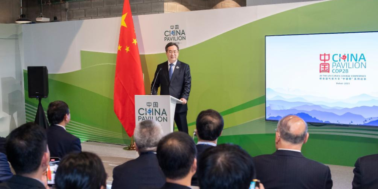 Chinese President Xi Jinping's Special Representative Ding Xuexiang, also a member of the Standing Committee of the Political Bureau of the Communist Party of China Central Committee and Chinese vice premier, visits the China's pavilion in Dubai, the United Arab Emirates, Dec. 2, 2023. Ding addressed the Group of 77 (G77) and China Leaders' Summit, which is held during the 28th session of the Conference of the Parties to the UN Framework Convention on Climate Change (COP28) in Dubai on Saturday. (Xinhua/Li Tao)