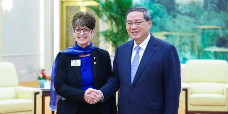 Chinese Premier Li Qiang meets with a delegation led by Patti Hill, the international president of the Lions Clubs International, at the Great Hall of the People in Beijing, capital of China, Dec. 10, 2023. (Xinhua/Liu Bin)