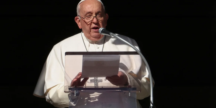 Pope Francis leads the Angelus prayer from his window at the Vatican on December 17. Guglielmo Mangiapane/Reuters